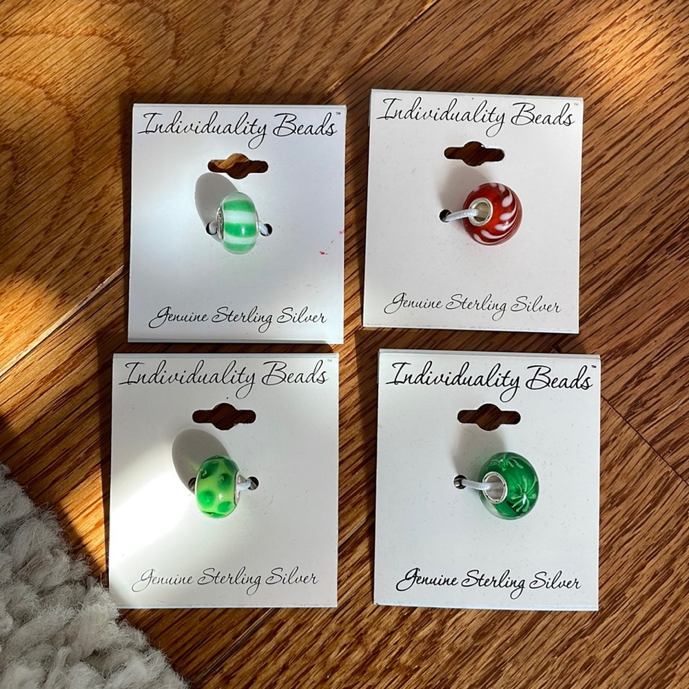 Set of 4 sterling silver charm bracelet beads